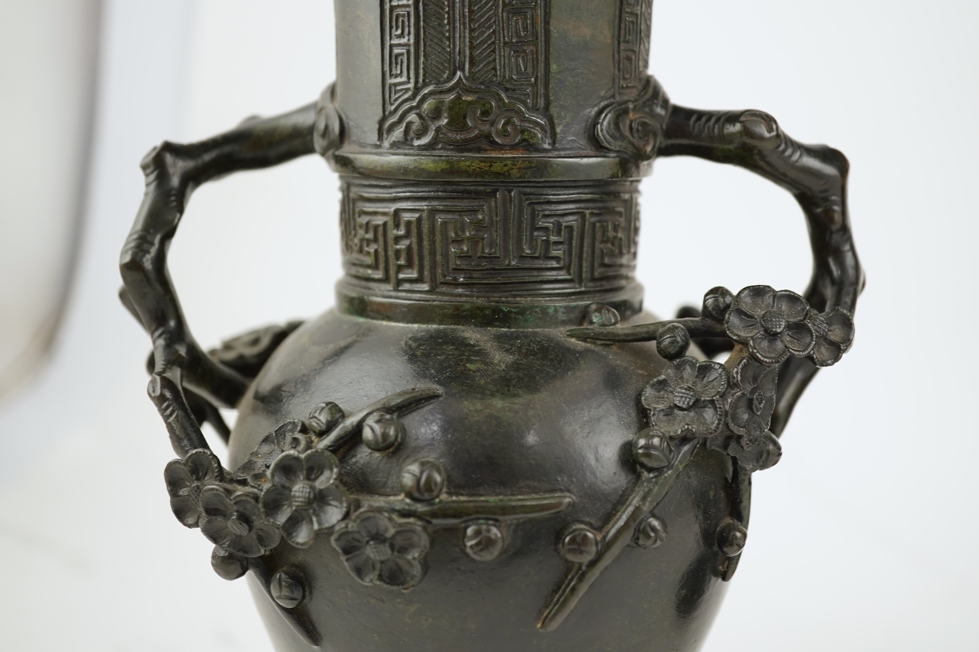 A pair of Chinese bronze gu-shaped vases, Qing dynasty
